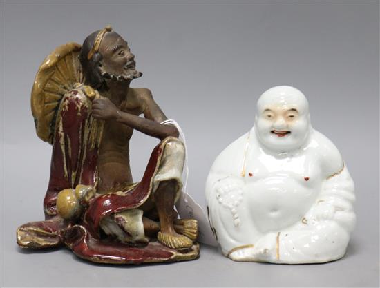 A Shiwan sang-de-boeuf glazed figure of a luohan and an enamelled porcelain figure of a Budai tallest 16cm